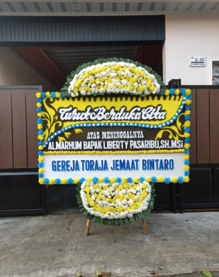Papan Bunga Duka di Ranah Pesisir